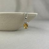 9ct White Gold Citrine Diamond Cushion Twist Halo Pendant