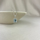 18ct White Gold Aquamarine Diamond Emerald Cut Halo Pendant