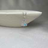 9ct White Gold Sky Blue Topaz Diamond Swan Pendant