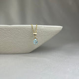 9ct Yellow Gold Sky Blue Topaz Claw Set Pendant