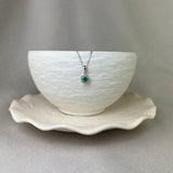 9ct White Gold Emerald Diamond Flower Halo Pendant