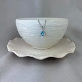 9ct White Gold Blue Topaz Diamond Cushion Pendant