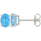 9ct White Gold Sky Blue Topaz Oval Claw Set Stud Earrings